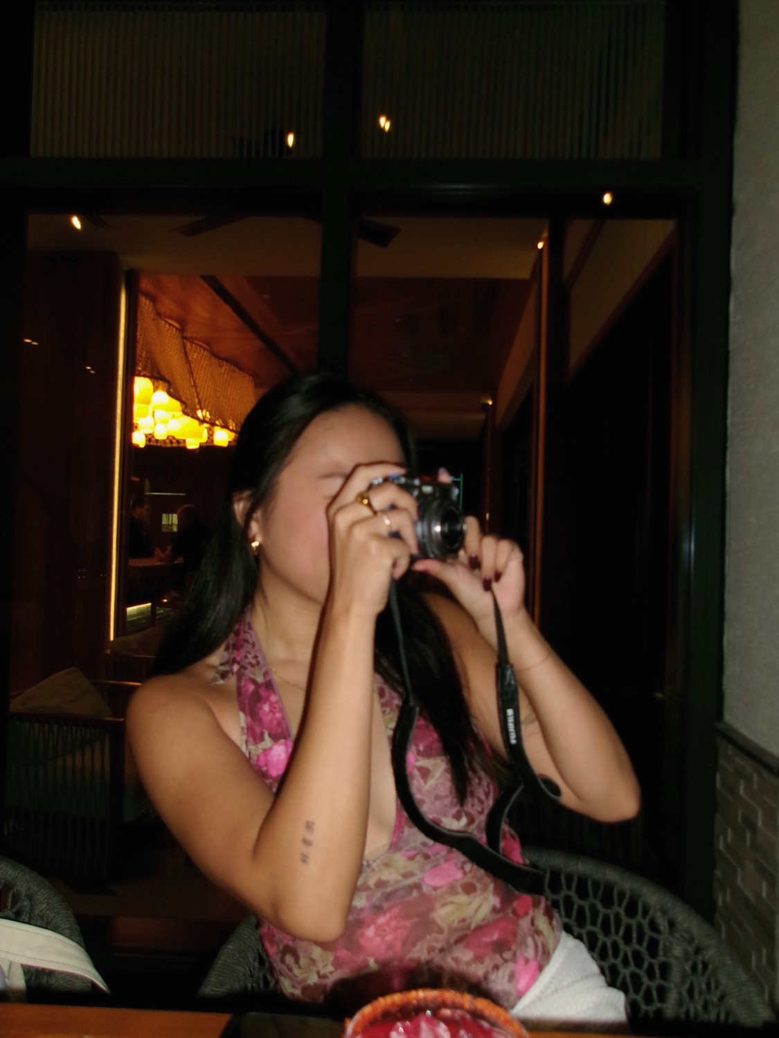 Helen holding one of the cameras she collects